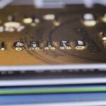 Types of Cards for People with Limited Credit History: Secured, Prepaid, and Credit Builder Cards 16 close up stacked credit cards gold blue and gree 2023 11 27 05 21 01 utc min