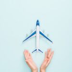 Southwest’s Recent Changes: What Travelers Need to Know 11 cropped view of woman holding hands near toy plane 2023 11 27 05 30 48 utc min