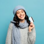 Capital One Venture: The Easiest Way to Earn $1,000 in Travel Rewards For Just $95 18 cheerful brunette woman with closed eyes holding c 2023 11 27 05 29 03 utc min