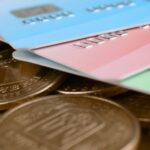 Mom's Point Of View-January Edition 15 ukrainian money coins and colored credit cards clo 2024 07 24 14 54 26 utc min